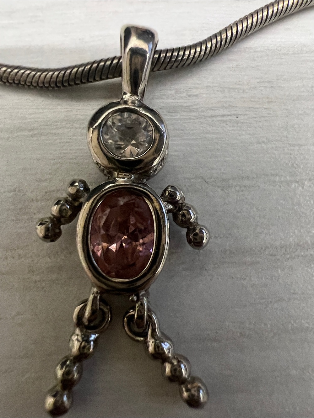 Sterling Silver Pink Gemstone Doll Pendant